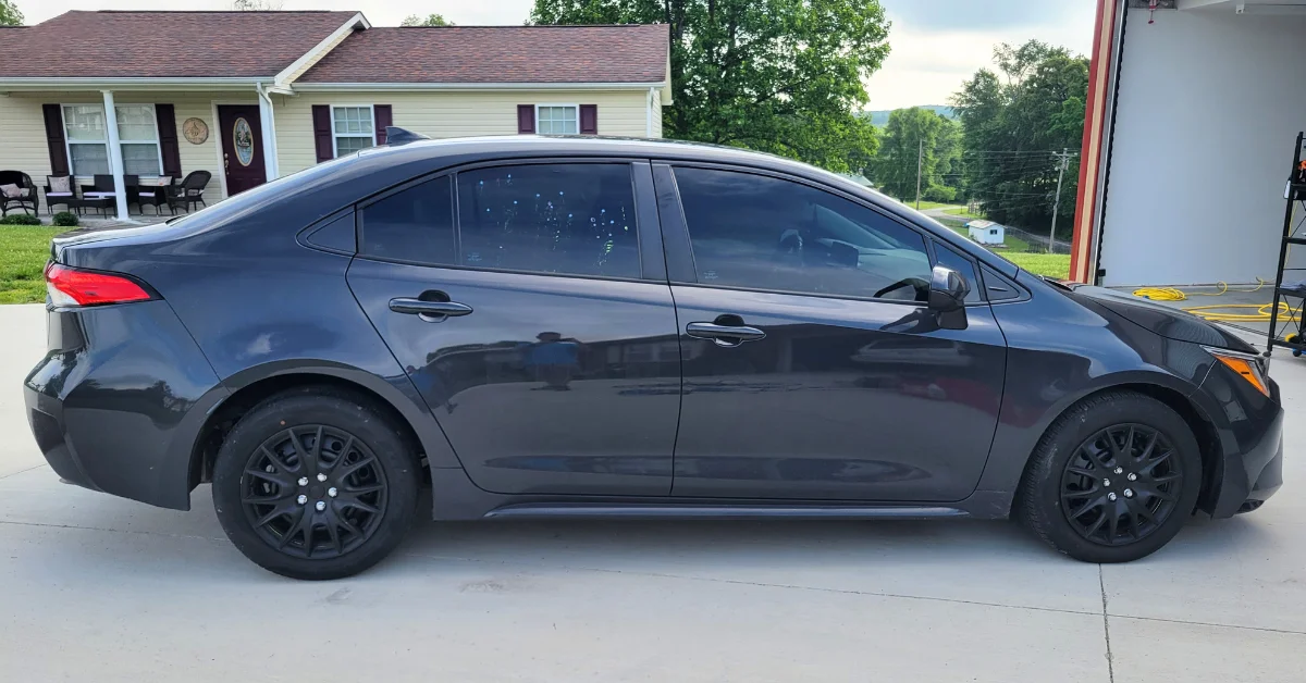 Before exterior auto detailing of a Toyota Corolla at Moonbow Auto Spa in Corbin, Kentucky.